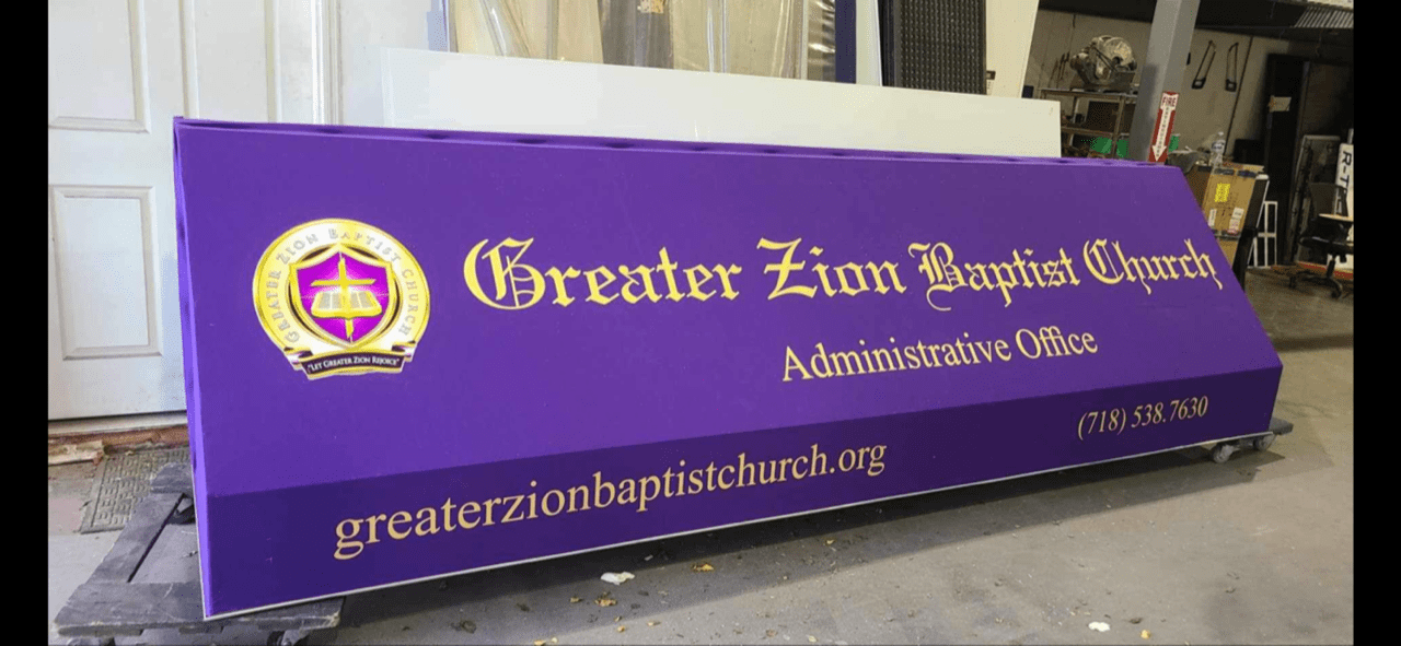 A sign that says greater zion baptist church.
