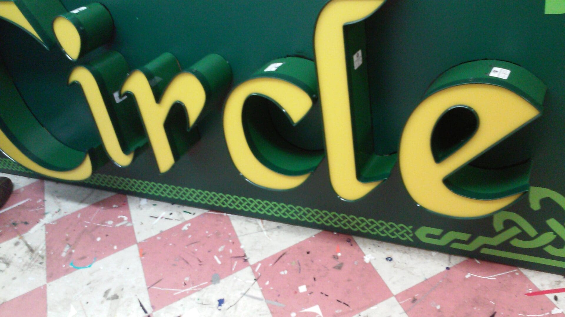 A close up of the letters on the floor
